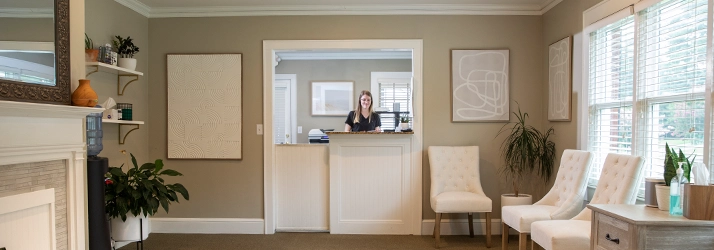 Chiropractic Lawrenceville GA Staff At Welcome Desk